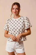 Ivory Bow Texture Woven Bubble Sleeve Top by So Me