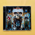 Classic Pop Dance CD, Featuring Tracks Including Black or White , Conveying Stage-Level Music Tension and Humanistic Care